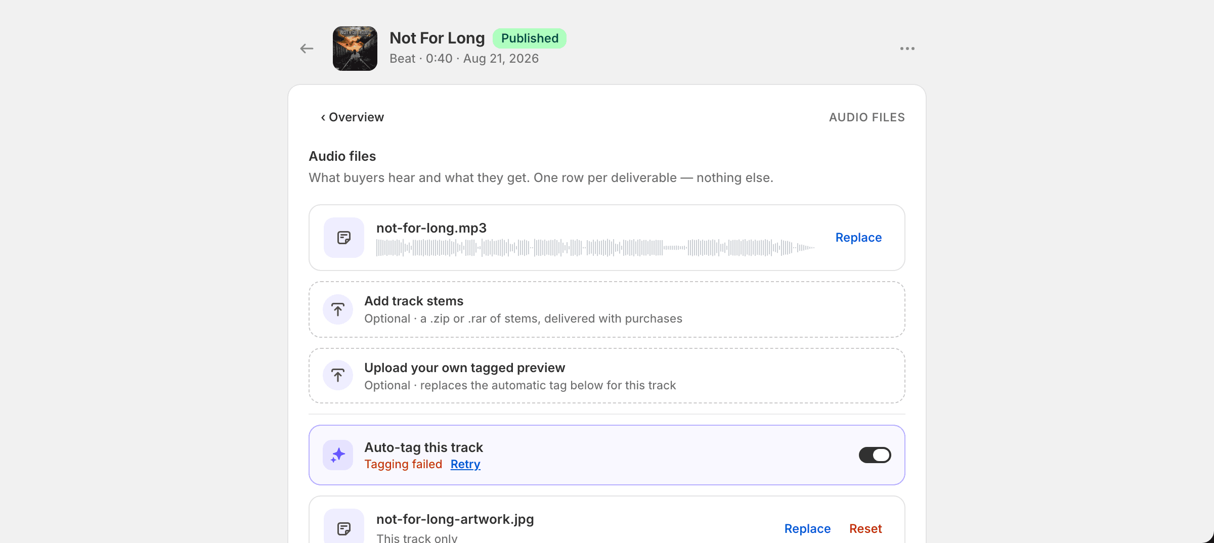 Auto-tag row in the failed state with a Retry button